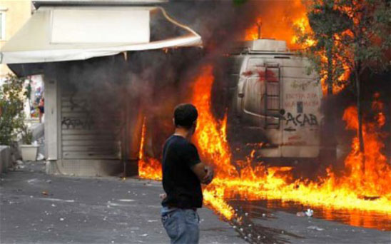 Riots in Greece A restaurant owner watches his asset burn amidst riots spreading throughout Greece: October 19, 2011